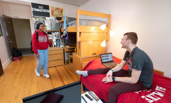 Photo of two 뿪¼ students in an on-campus residence hall